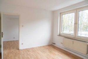 mehrfamilienhaus-kaufen-muenster-muenzstrasse-zimmer-laminat-parkblick